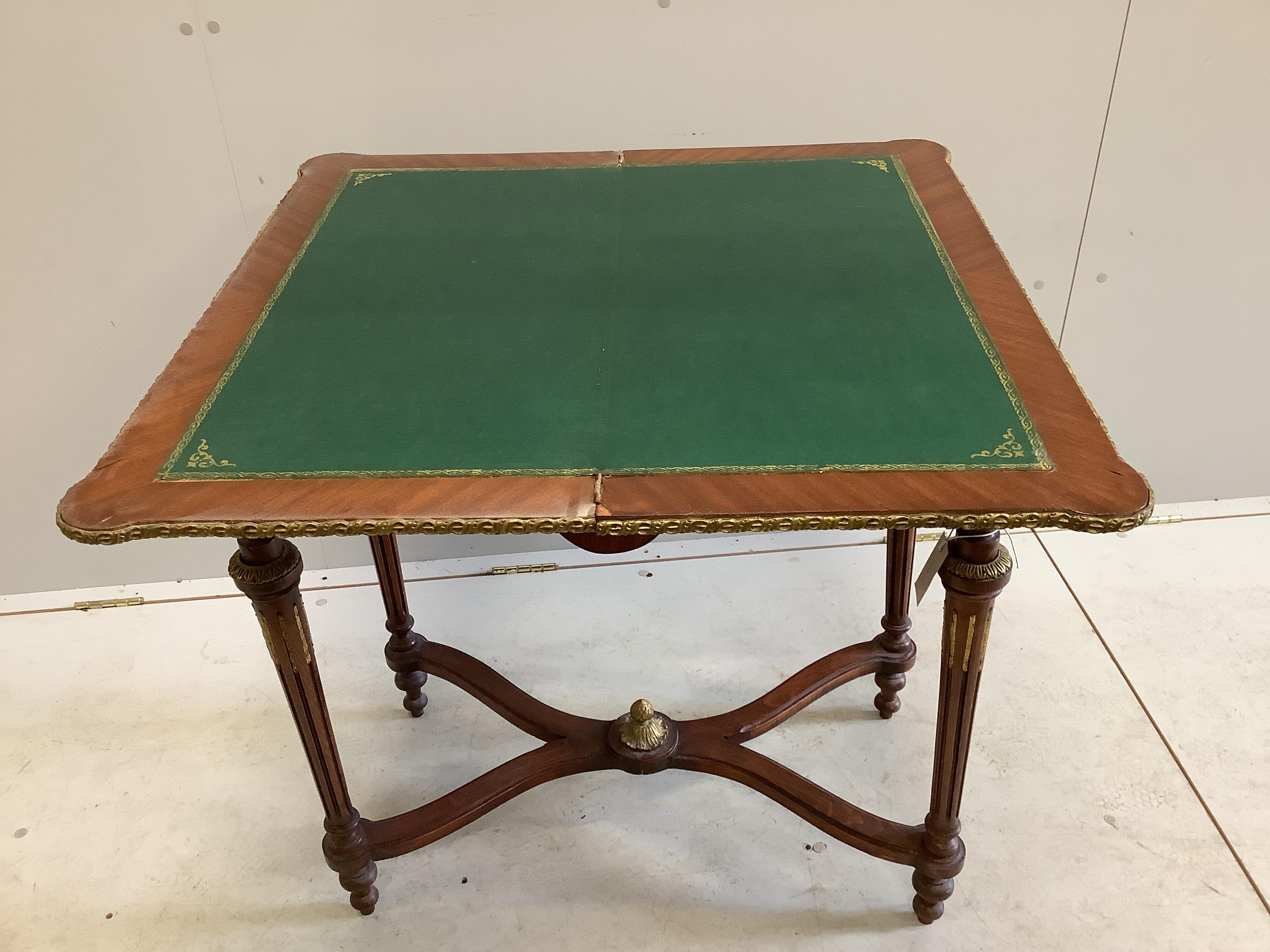 A Louis XVI style gilt metal mounted and marquetry inlaid folding card table, width 77cm, depth 40cm, height 78cm